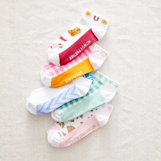 Collection of colourful cotton trainer socks with sayings
