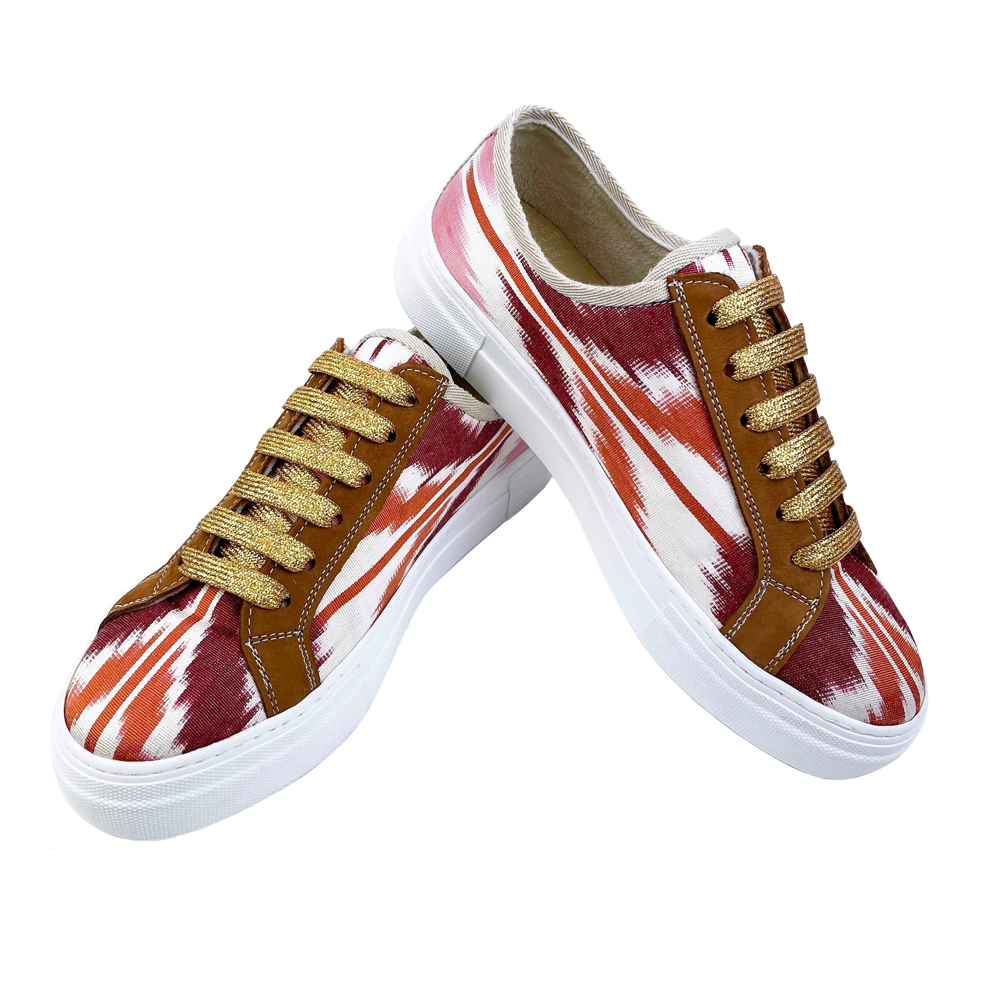 Red, pink, orange and white Ikat silk sneakers with tan leather and gold glitter laces