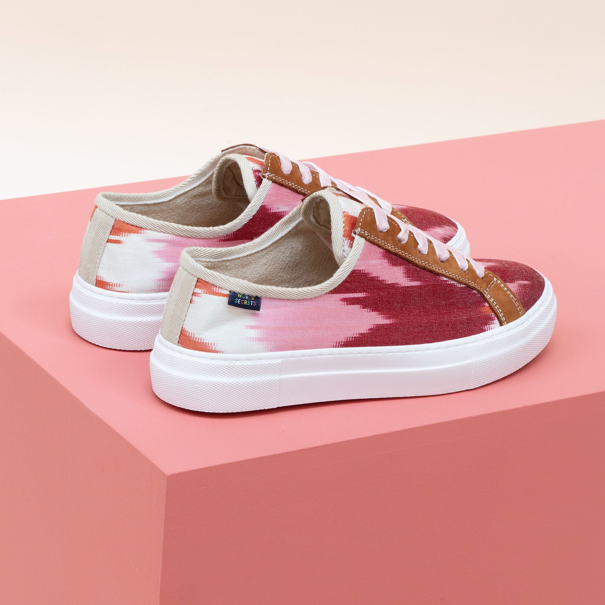 Pink and red Ikat silk sneakers with tan leather